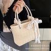 Straw bag women's 2025 new high-end texture niche seaside season versatile messenger bag fashionable portable woven bag