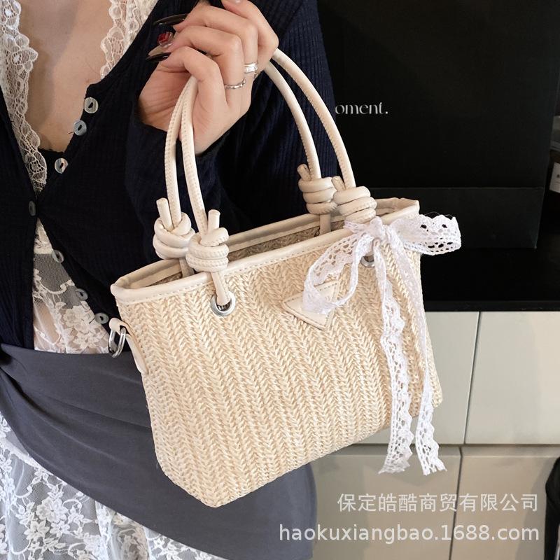 Straw bag women's 2025 new high-end texture niche seaside season versatile messenger bag fashionable portable woven bag