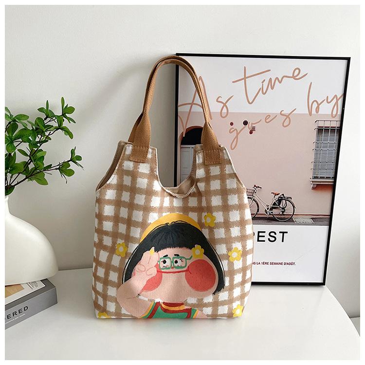Korean version of cartoon graffiti illustration large capacity canvas bag girl funny hand-drawn comic portable shoulder bag tide