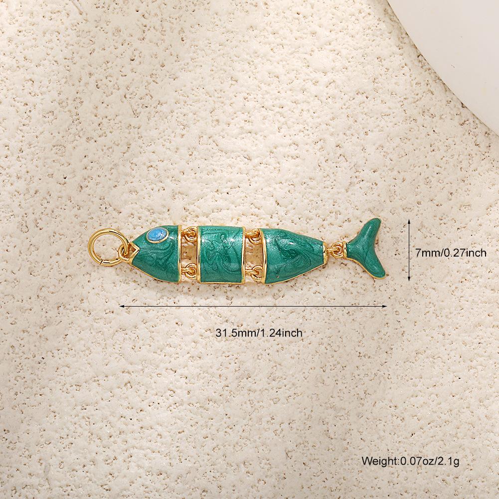 

Подвеска-рыбка с драгоценными камнями One size