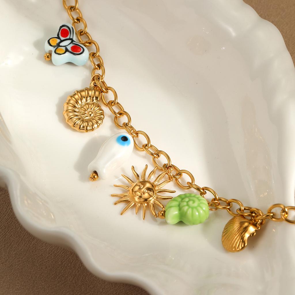 GEMCHIC Women's Ocean Beach Vacation Stainless Steel Necklace with Seashell and Sun Charms