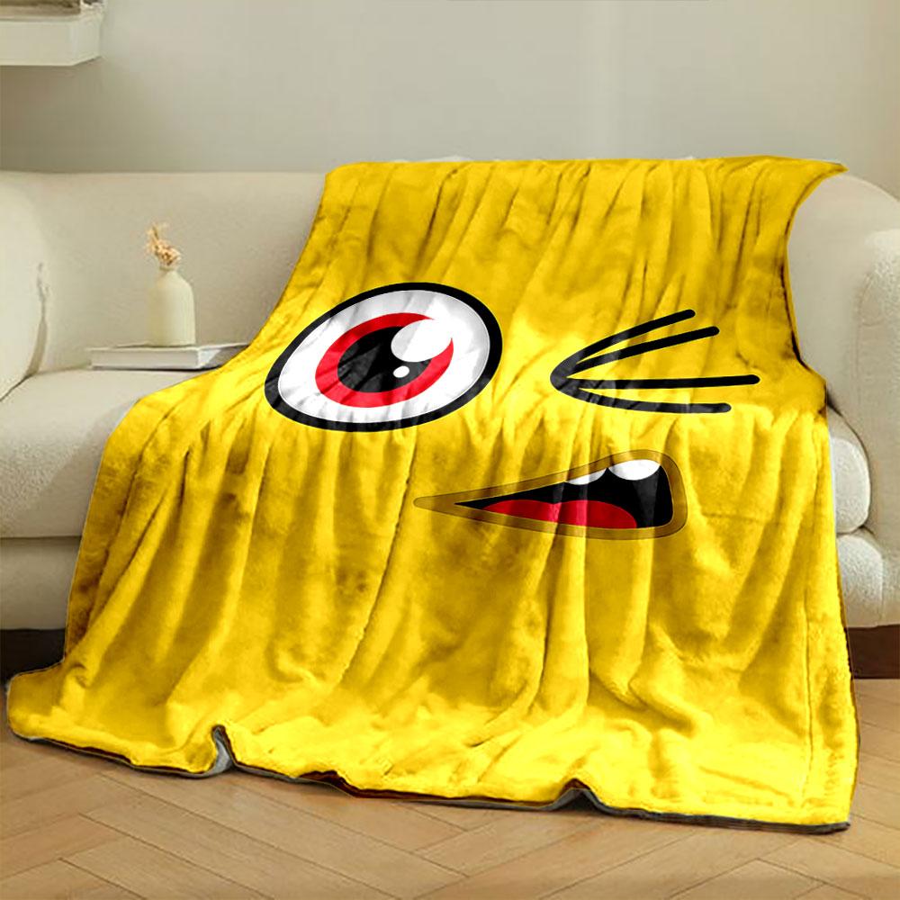 Yellow background with a winking cartoon face, red eye, and open mouth. for all seasons blanket lunch break throw gift