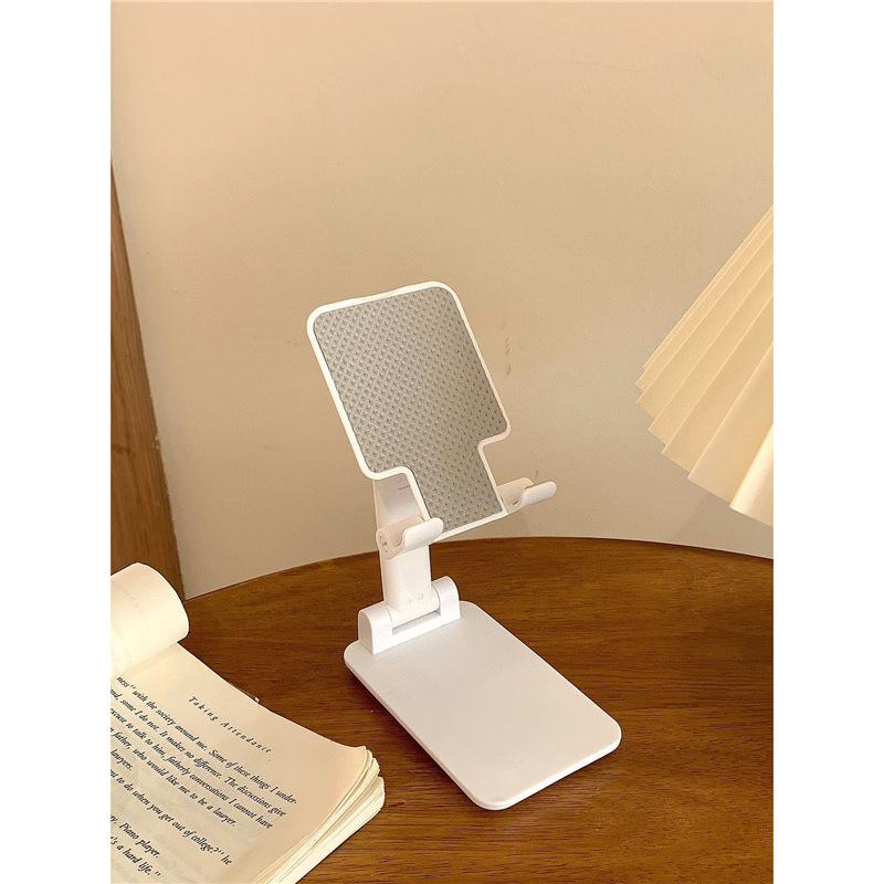 Foldable Phone & Tablet Stand: Portable, Adjustable & Universal