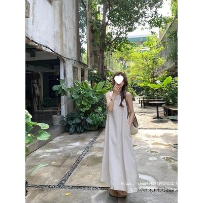 Japón y Corea del Sur vestido de tirantes sin espalda para vacaciones sin mangas chaleco diseño de verano para mujer nicho suelto blanco vestido de playa