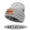 2022 new autumn and winter acrylic wool pullover hat European and American hip hop leather label women's knitted hat
