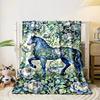 A blue horse entwined with vines and surrounded by blue peonies. for all seasons blanket lunch break throw gift