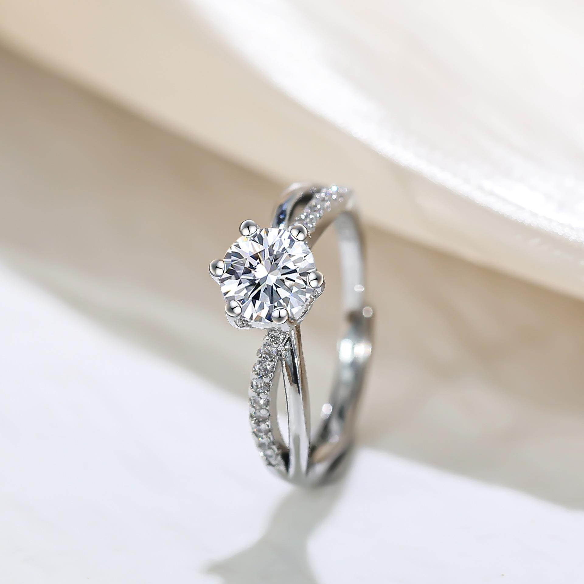 

Classic 4-Prong Solitaire Ring with Micro-Pavé Accent Stones & Crisscross Band - 925 Silver Plated White Gold Engagement Promise resizable