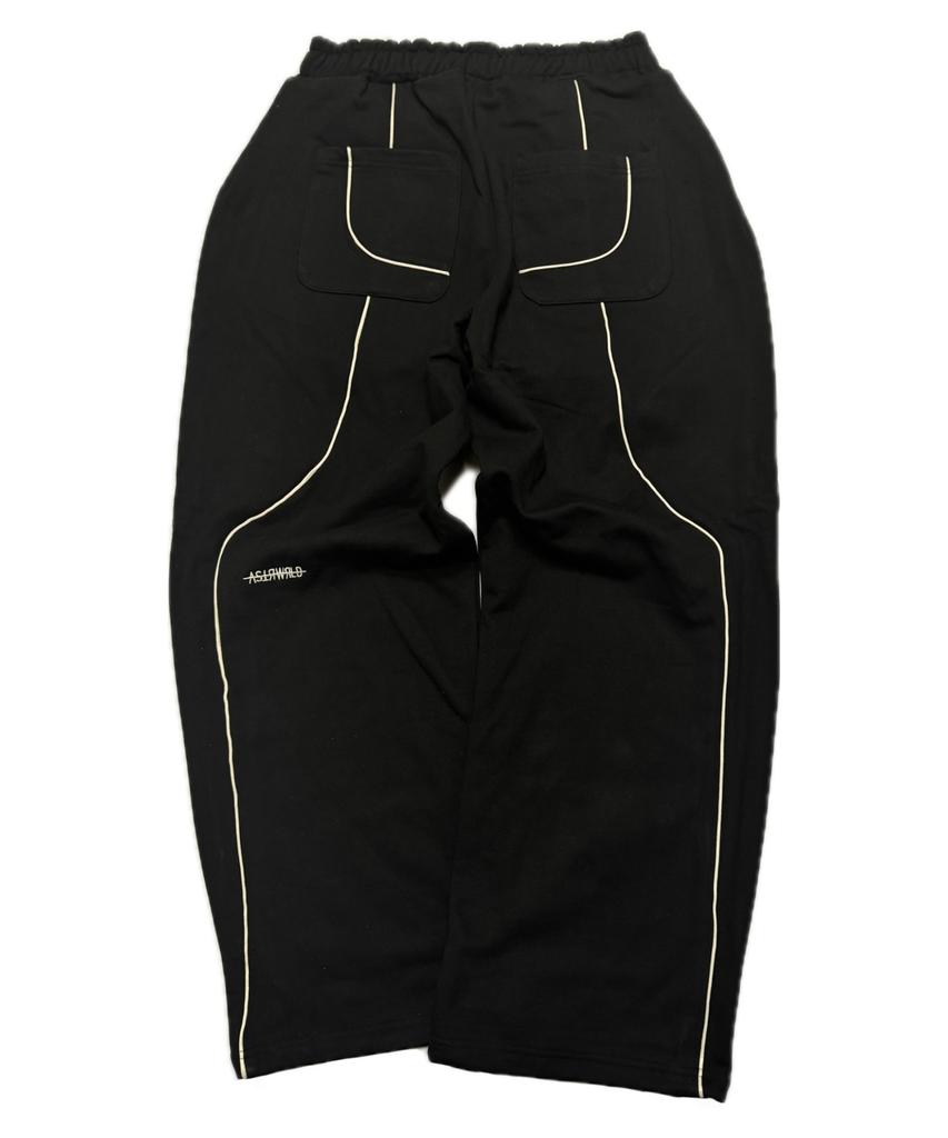 Aseuteleuwoldeu Symbol Logo Two-Tuck Cotton Track Pants (Black)