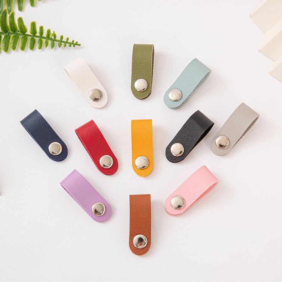 

Організатор кабелю та пряжка для шарфа зі шкіри корови на кнопці-кліпсі