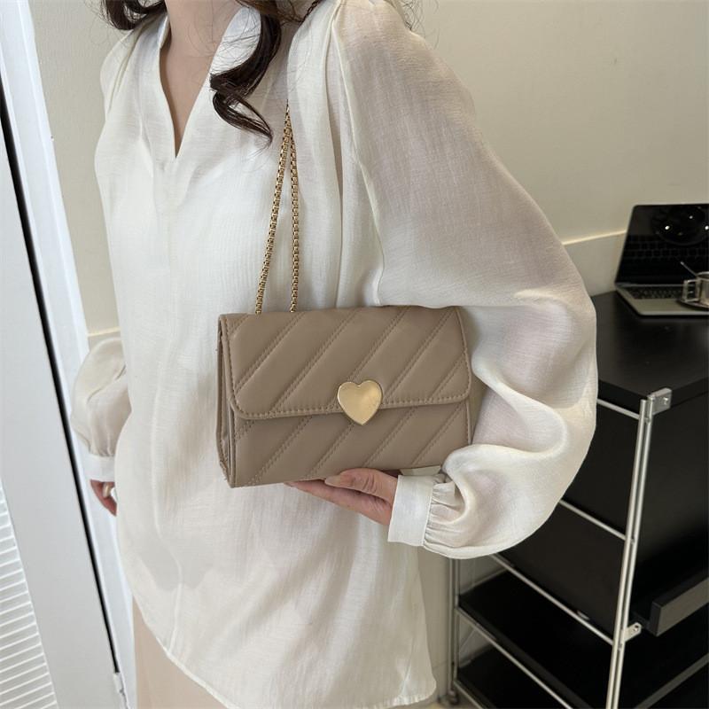 Stilvolle gesteppte PU-Handtasche für Damen in Schwarz, Khaki, Pink und Weiß. Perfekt für den lässigen Chic.