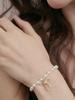 Sosoo Pearl Ribbon Wave Bracelet