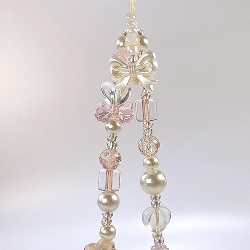 Niedlicher Glas Schleifenknoten Blume Perle Handy-Anhänger Charm Kette Knoten Handy-Lanyard Schlüsselanhänger Mädchen Tasche Kamera Anhänger für Airpods Hülle