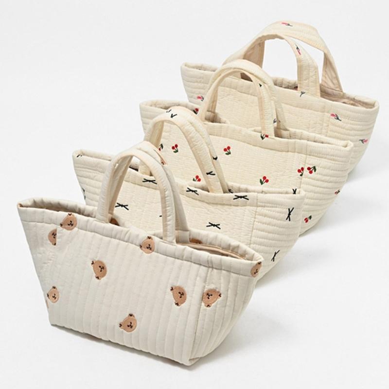 Reisetasche Wickeltasche für Frauen Große Kapazität Stickmuster Handtasche Kinderwagen Hängende Tasche Mama-Tasche