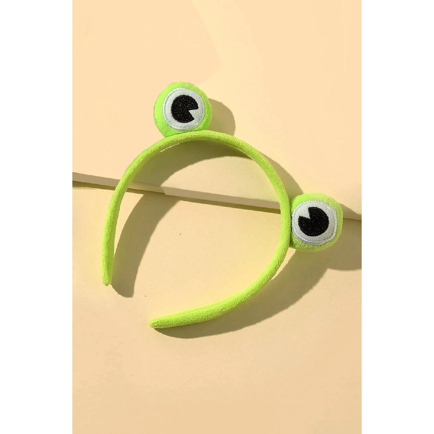 

Плюшевая корона с зеленым лягушачьим глазом