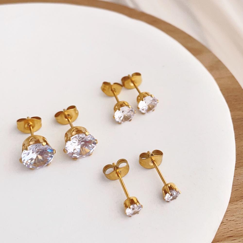 Super flash zircon temperament stud earrings, simple single diamond titanium steel earrings, women's niche two-color optional gifts
