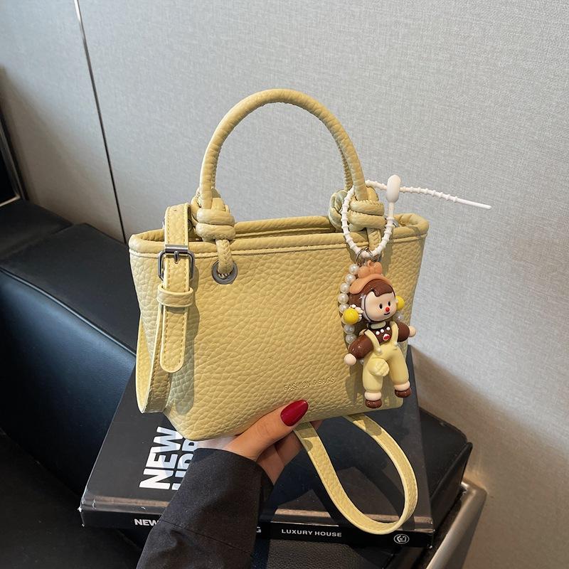 Fashion high-end hand bucket bag spring and summer simple and versatile shoulder bag trendy niche messenger bag