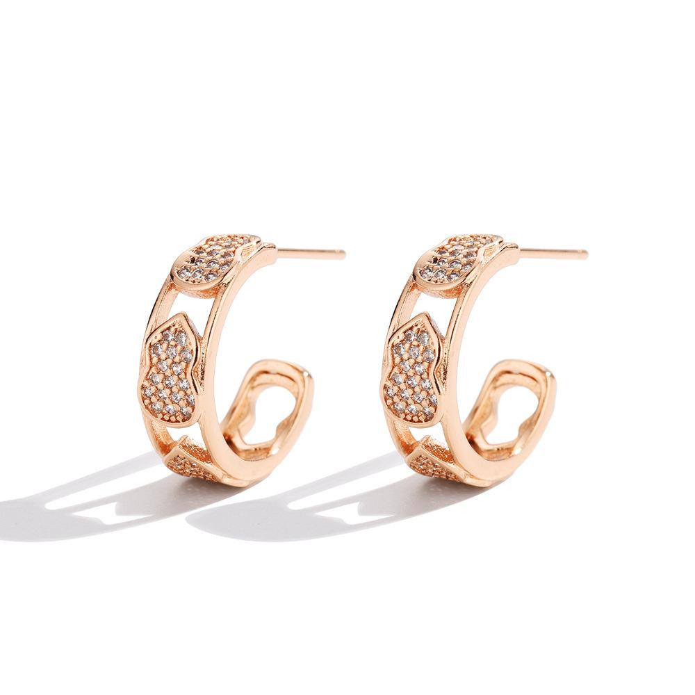 

Retro hollow diamond-encrusted gourd stud earrings, fashionable earrings, niche earrings, tide earrings.