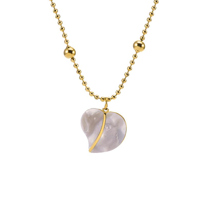 Elegant Gold Titanium Steel Women's Necklace with White Shell, Zircon, and Monogram Tassel