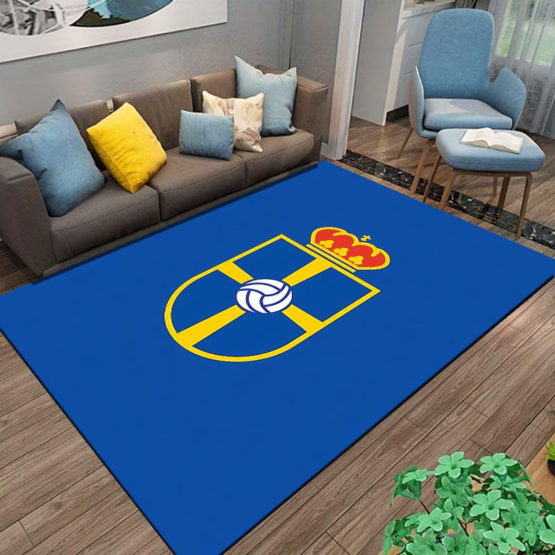 Blue Carpet with Crest Design Suitable As a Non-slip Mat for the Living Room or Bedroom Sofa