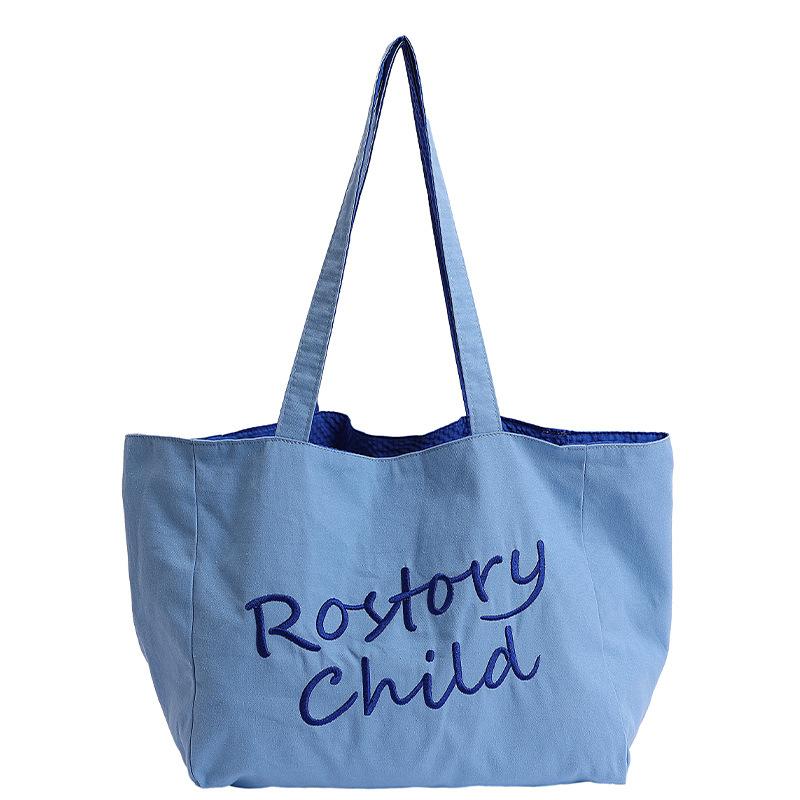 

Trendy large capacity tote bag women s 2025 summer new high-end texture embroidered student commuter shoulder canvas bag