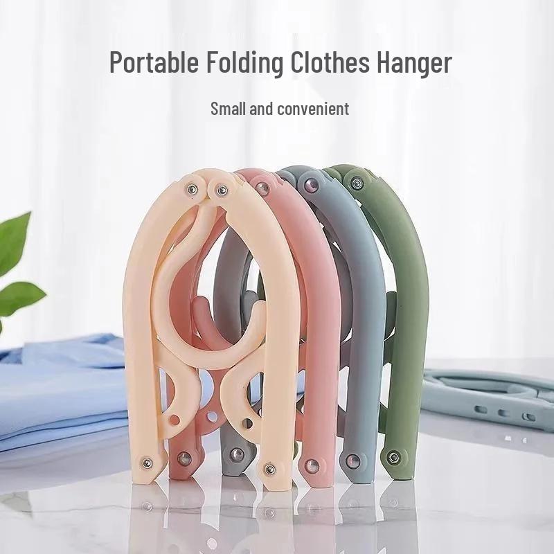 

Portable Multifunctional Folding Clothes Hanger for Travel and Dorms - No Trace, Compact Drying Solution