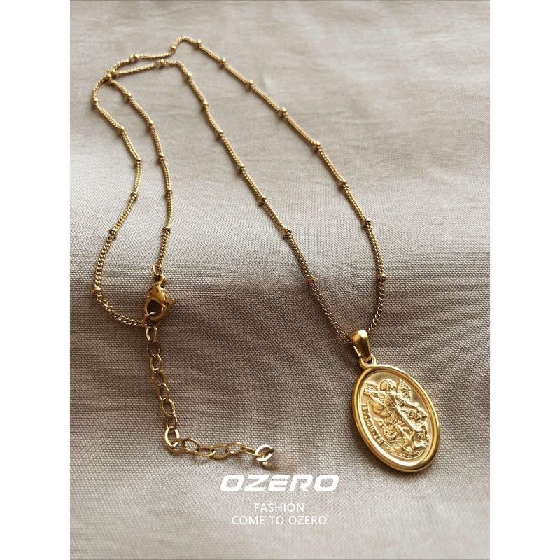 

Titanium Steel Plated 18K Gold European and American Style Oval Portrait Coin Cross Necklace Female Retro Niche Design Gold Coin Portrait Necklace