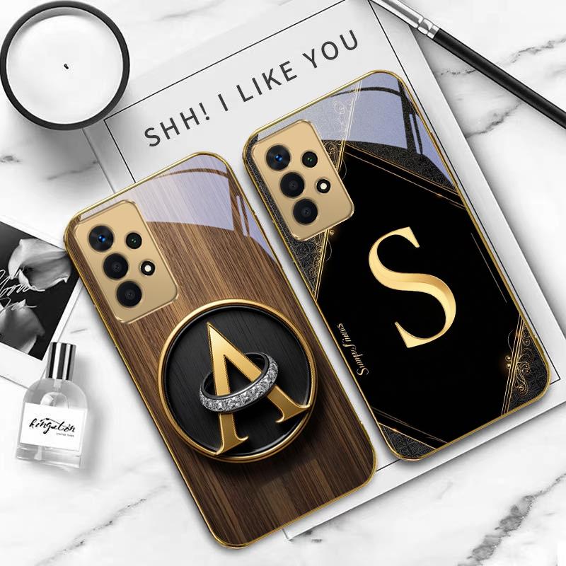 Luxurious emblem letters For Samsung A 01 52S A04 A05S A10 A12 13 22 23 24 36 42 M02 Note 10 20Ultra 8 9 Golden glass phone case
