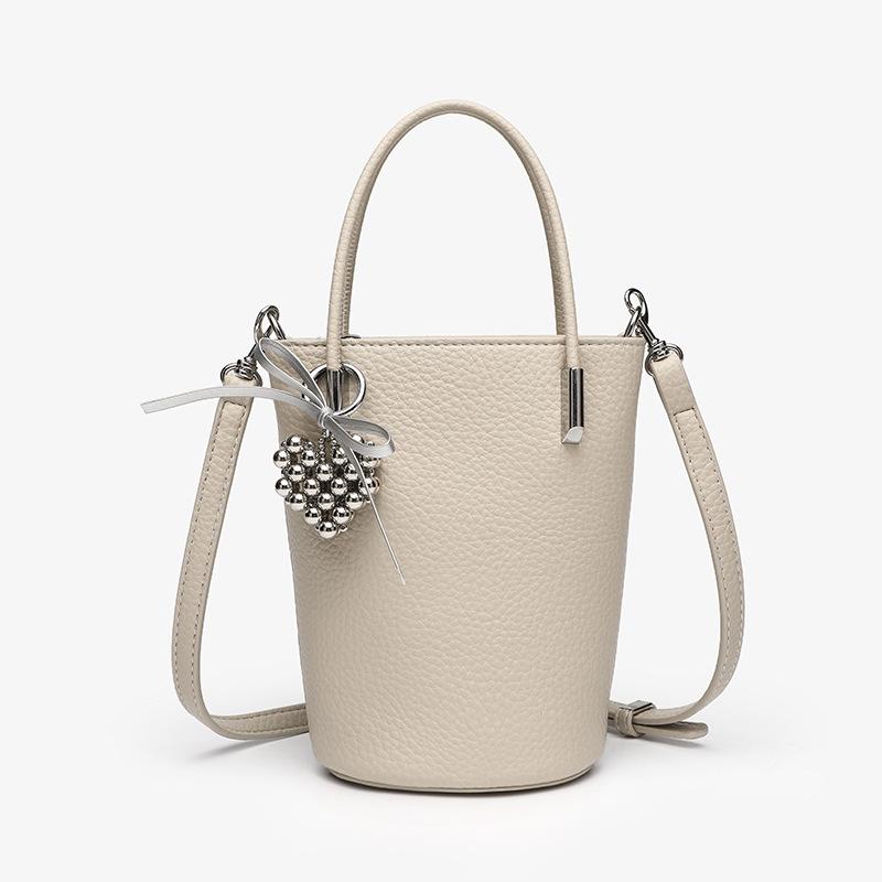 

Легкая Роскошь Нишевая Изысканная Высокого класса Маленькая Сумка-тоут для Женская Новая Универсальная Большая Вместимость Сумка-ведро Сумка через плечо Лето