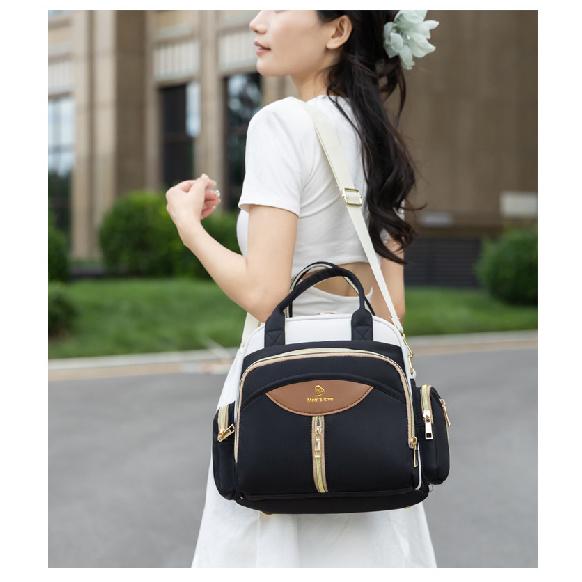 New mommy bag, multi-functional, large capacity, lightweight, with separate compartments for wet and dry items, can be carried as a backpack or