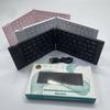 Wireless Bluetooth Two Folding Mini Keyboard Tablet Phone Notebook Three System Universal Portable Compact Keyboard