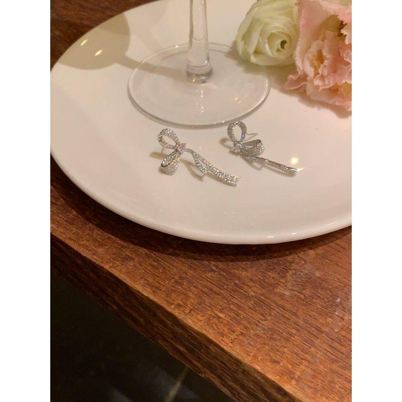 

Niche Design Female Mosquito Coil Ear Clip Bows 925 Tremella silver Pair