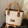 Summer hand bag small bucket bag women's 2025 new simple high-end shoulder bag niche messenger straw bag