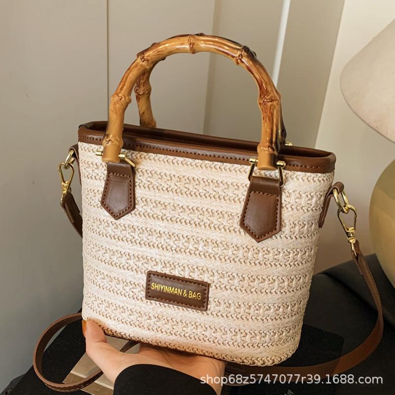 Summer hand bag small bucket bag women's 2025 new simple high-end shoulder bag niche messenger straw bag