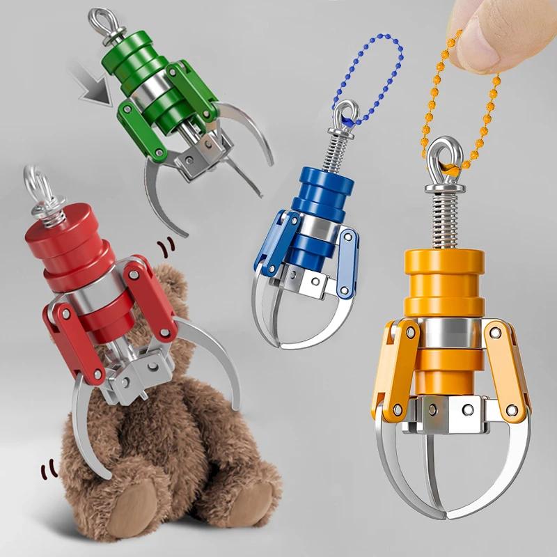 Mini Pinza Creativa Decompressione Punta Dita Portachiavi Macchina a Graffe Bambola Ciondolo Fai da Te Giocattolo Divertente Regalo