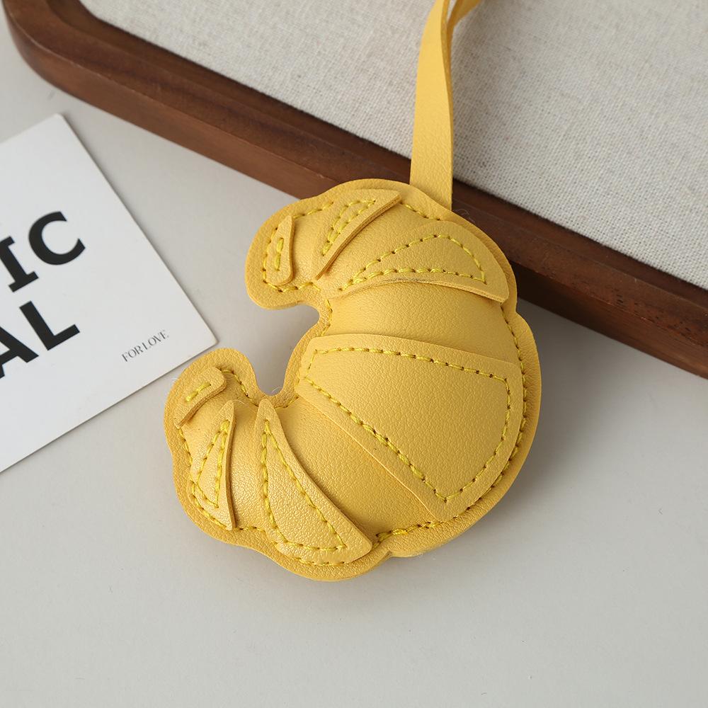 Croissant pendant creative simple bag keychain luggage pendant PU leather leather multi-layer patch pendant