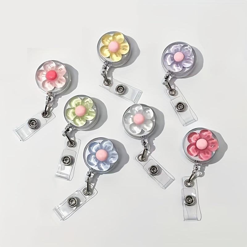 2D A Set of 7 Durable, Color Coded Retractable Lanyards with Floral Design And Safety Clips for Easy Access. 7pcs