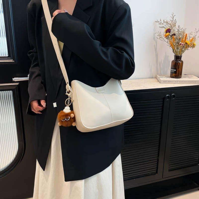 Textured versatile bucket bag women's new trendy Korean version fashionable wide shoulder strap foreign style single shoulder oblique A