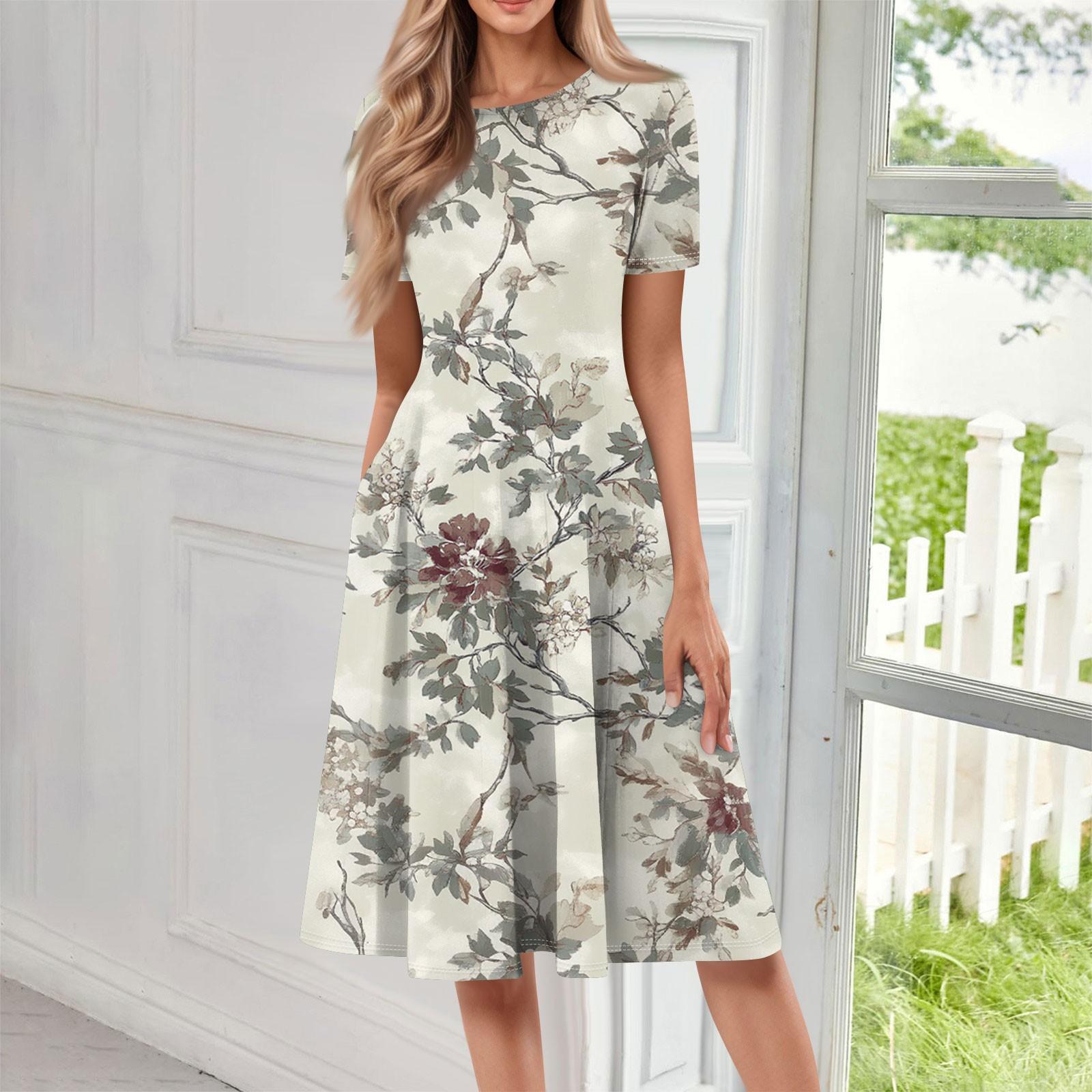 

Женское свободное повседневное и модное платье с круглым вырезом и короткими рукавами, средней длины с принтом M