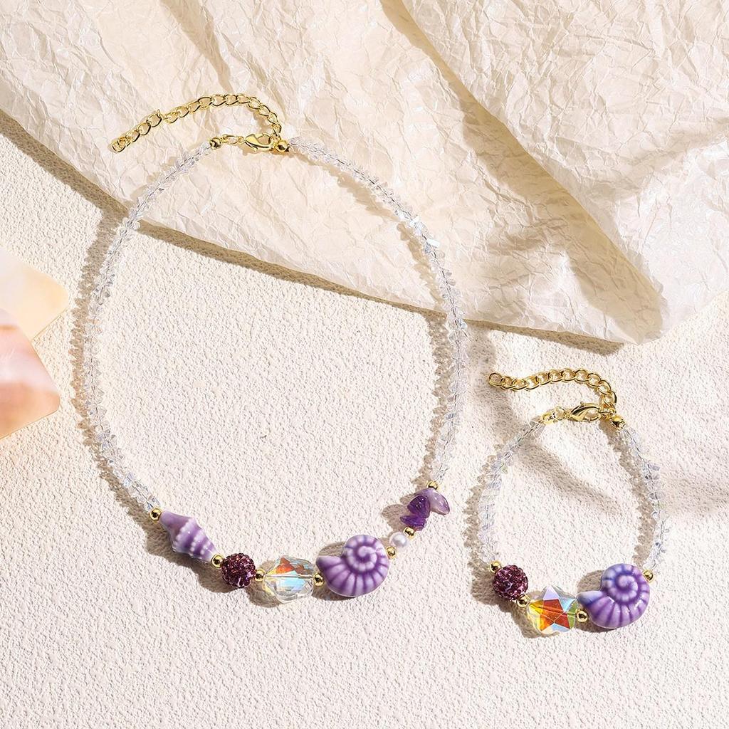 Seaside Elegance: Starfish & Shell Bead Bracelet with Oceanic Flair