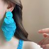 French Round Shell Tassel Stud Earrings: Retro, Exaggerated Style for a Unique Fashion Statement.