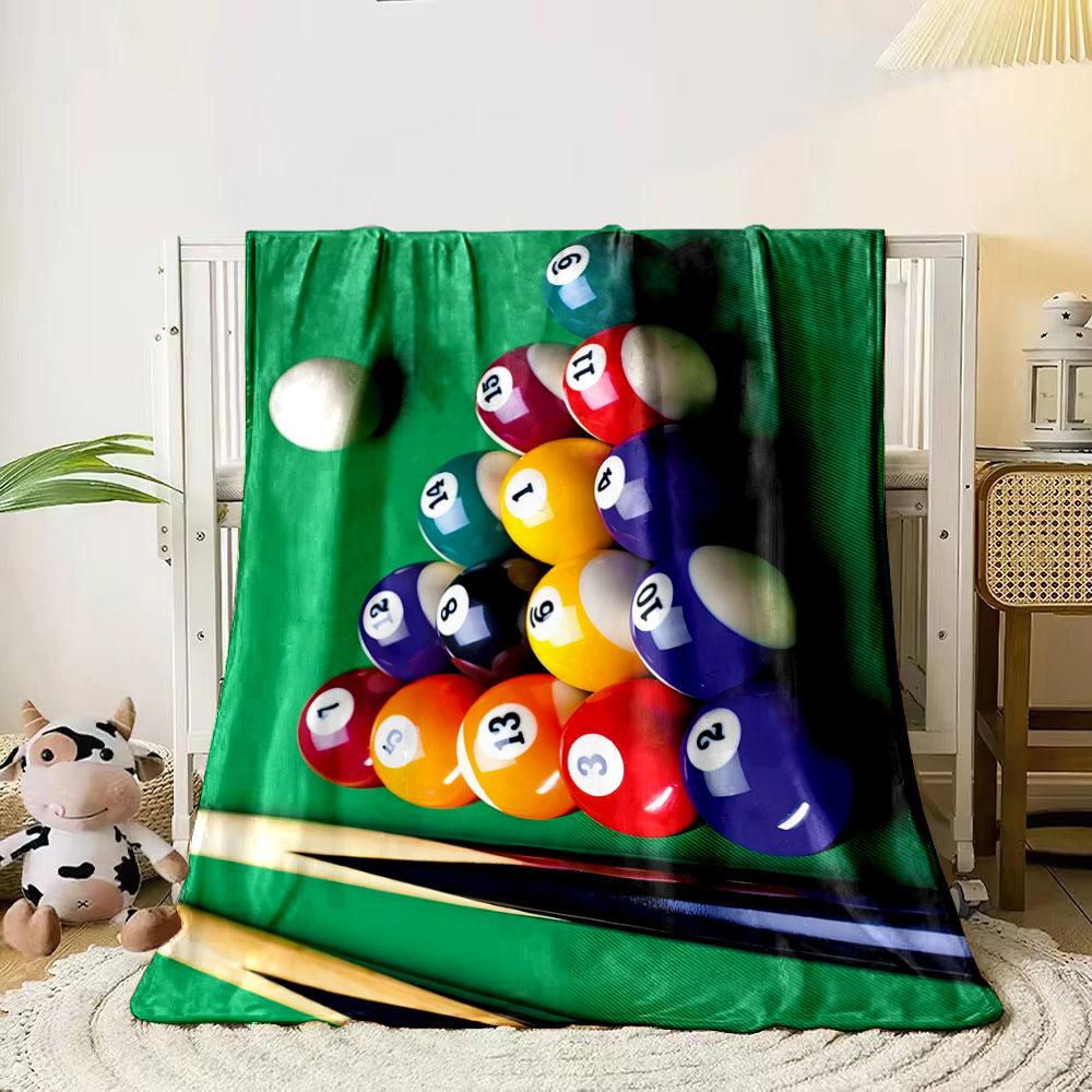 A triangular arrangement of numbered billiard balls with cue sticks nearby. for all seasons blanket lunch break throw gift 80cm x 120cm
