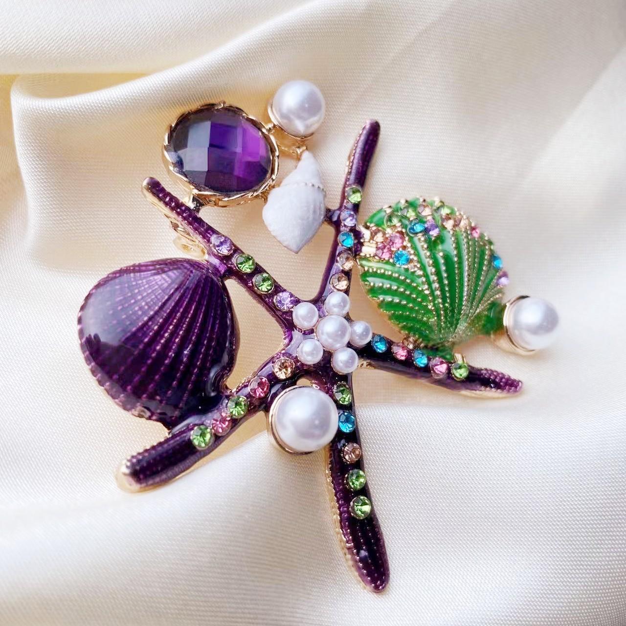 

Модная креативная фиолетовая брошь в виде морской звезды с гребешком, персонализированная мультяшная брошь в виде морской жизни, аксессуары фиолетовый