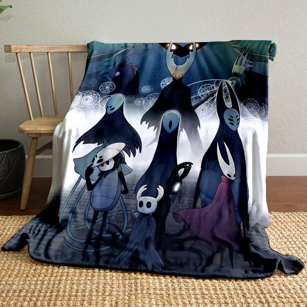 The pattern depicts dark, stylized insect-like characters in a mystical scene. for all seasons blanket lunch break throw gift