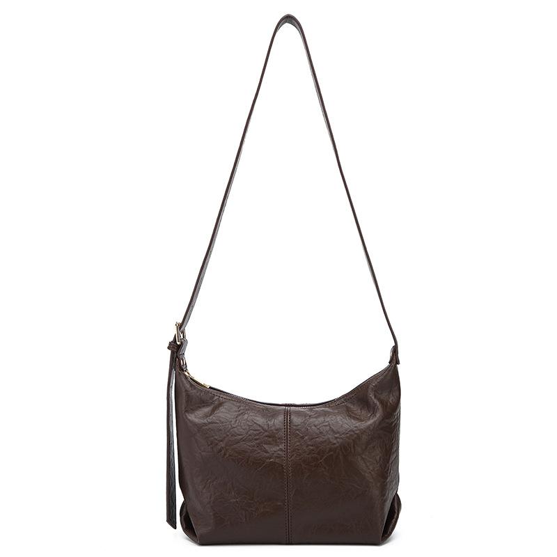 

Сумка большой вместимости женская 2025 лето новая ретро универсальная на плечо сумка-мессенджер текстура интернет-знаменитость дорожная сумка-пельмень темно-коричневого