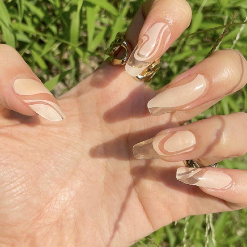 Glossy & Nude Diesel Nails