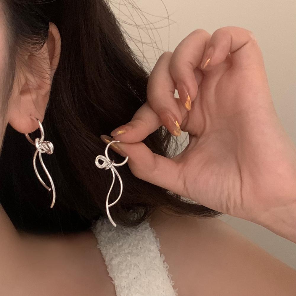 Trendy European & American Bow Pendant Stud Earrings with Tassels