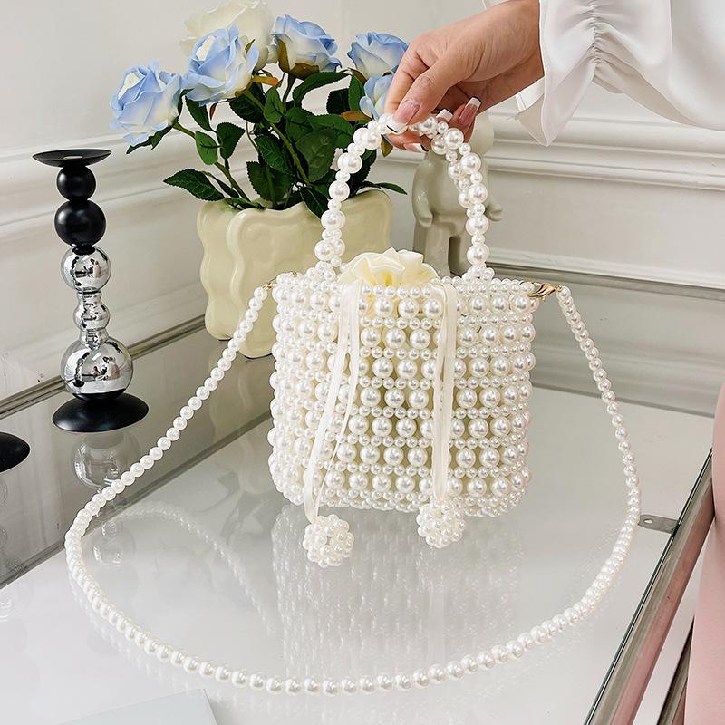 Spring beaded retro fashion sweet pearl hand strap personality trend shoulder personality messenger women's bag