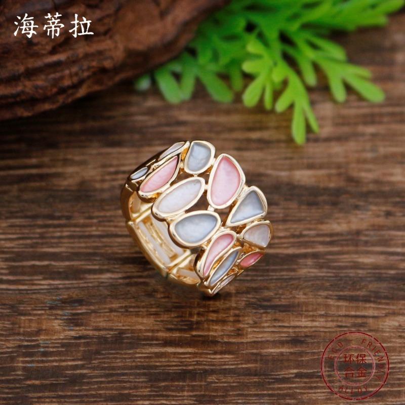 New enamel color hollow geometric petal elastic ring women's simple high-end versatile flower ring