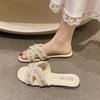 Xiaoxiangfeng soft-soled slippers female outer 2025 autumn new flat bottom one word summer pearl beach fairy fashion foreign style