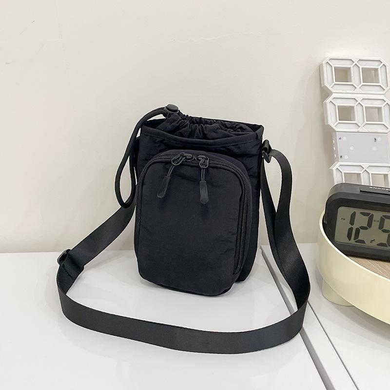 Crossbody bag women's new Korean version of simple solid color small square bag casual versatile mobile phone bag student water cup bag tide